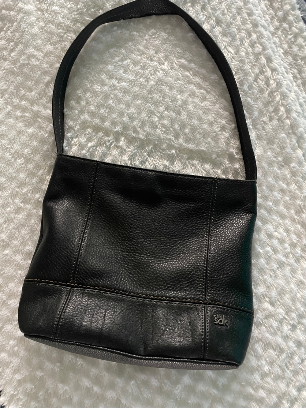 The Sak Black Pebbled Leather Shoulder Bag with Logo Accent